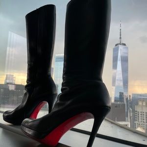 Christian Louboutin Boot with 4.5”” Tall Black Heeled Boots. Signature Red Paint
